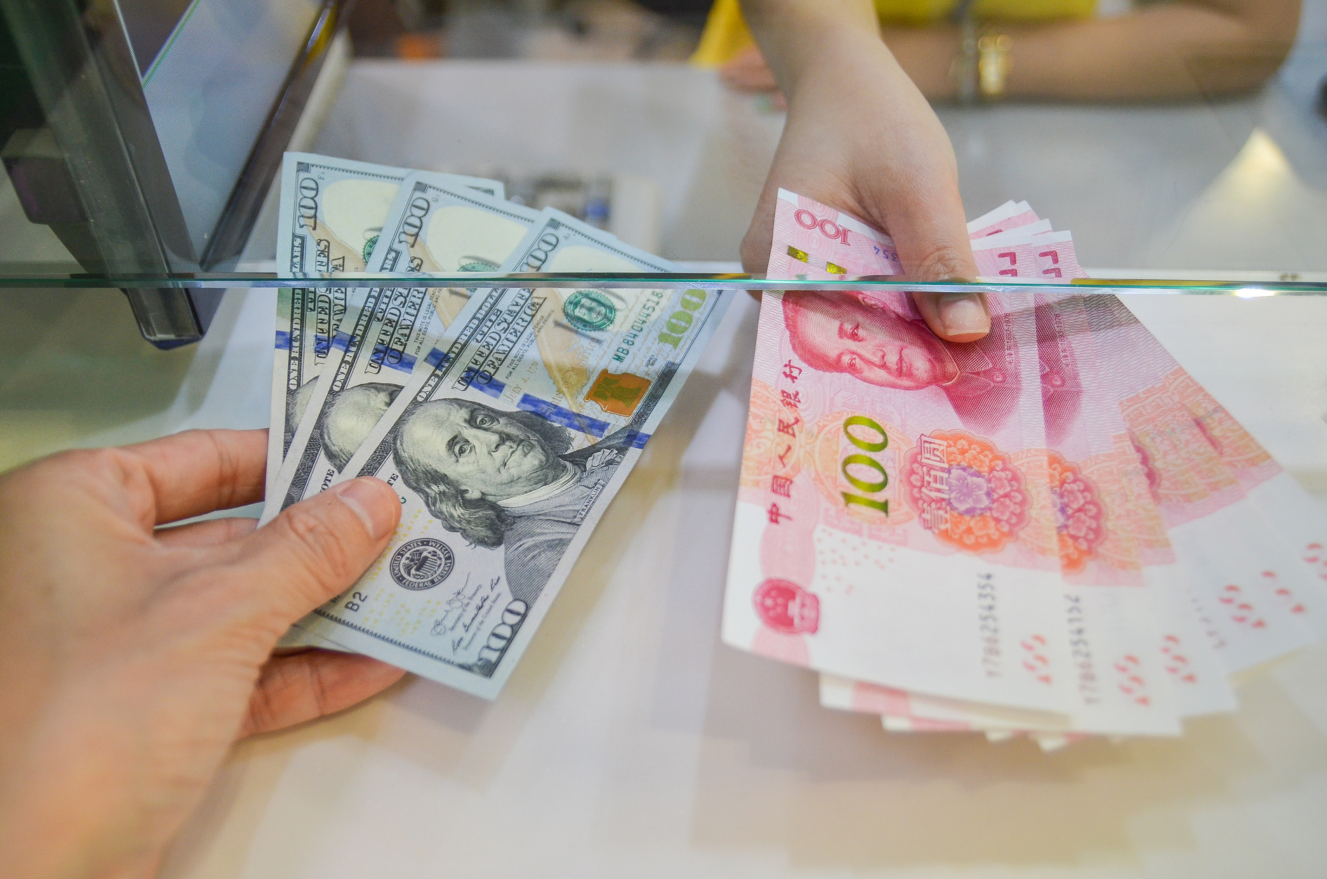 Exchange money, Exchange US dollar or American dollars (USD) for Chinese money or Renminbi (RNB)